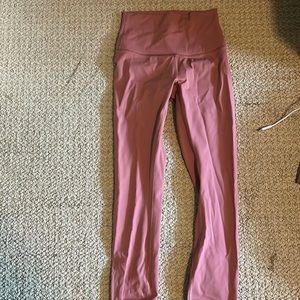 Pink lululemon wonder train leggings